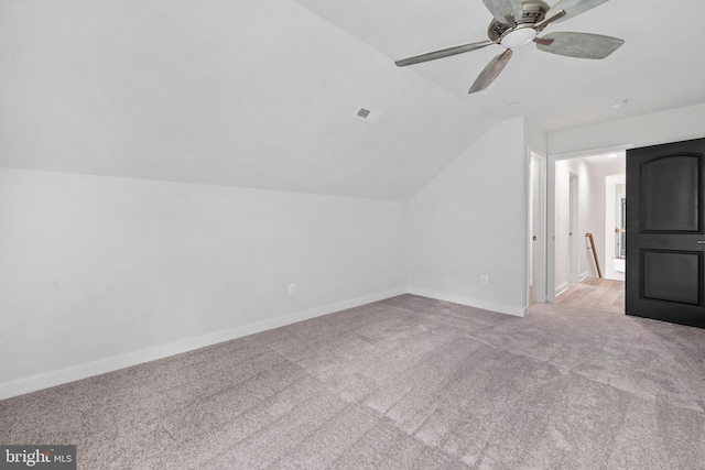 14875 Buckingham Ct, Issue, MD 20645 - additional living space with carpet floors, vaulted ceiling, a ceiling fan, and baseboards