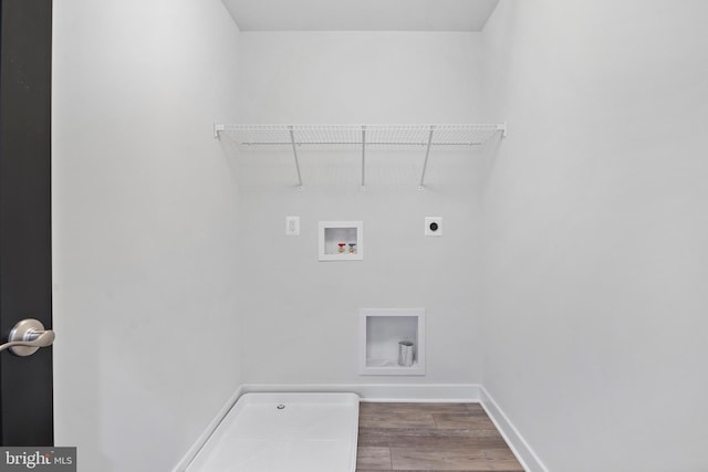14875 Buckingham Ct, Issue, MD 20645 - laundry area featuring electric dryer hookup, wood finished floors, baseboards, and washer hookup