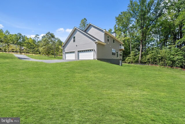 14875 Buckingham Ct, Issue, MD 20645 - view of side of property with a chimney, a yard, an attached garage, and driveway