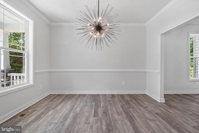 14875 Buckingham Ct, Issue, MD 20645 - unfurnished dining area featuring a chandelier, wood finished floors, ornamental molding, and baseboards