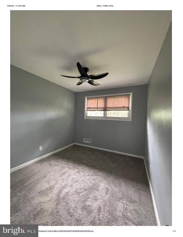 7204 Croydon Rd, Baltimore, MD 21207 - spare room featuring carpet floors, a ceiling fan, and baseboards