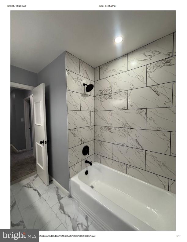 7204 Croydon Rd, Baltimore, MD 21207 - bathroom with marble look tile flooring, baseboards, bathtub / shower combination, and recessed lighting