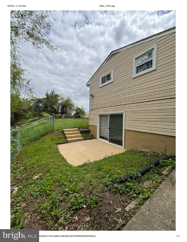 7204 Croydon Rd, Baltimore, MD 21207 - view of home's exterior featuring fence and a patio