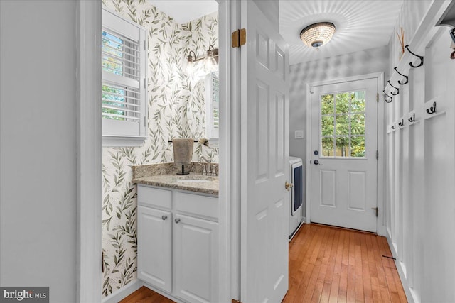 107 Forest Ave, Medford, NJ 08055 - doorway featuring a wealth of natural light, wallpapered walls, and a sink