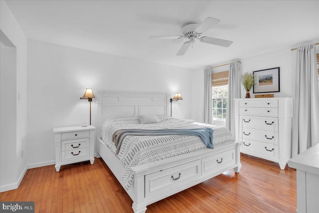 107 Forest Ave, Medford, NJ 08055 - bedroom featuring baseboards, a ceiling fan, and light wood-style floors