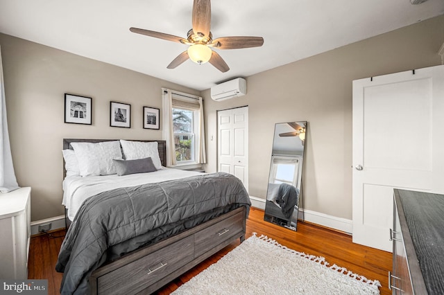 4037 Mitchell St, Philadelphia, PA 19128 - bedroom with a wall mounted air conditioner, wood finished floors, and multiple windows