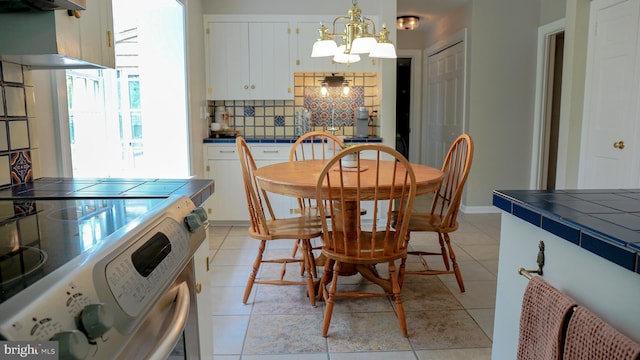 30 Woods Ln, Hanover, PA 17331 - dining space with a chandelier and light tile patterned flooring