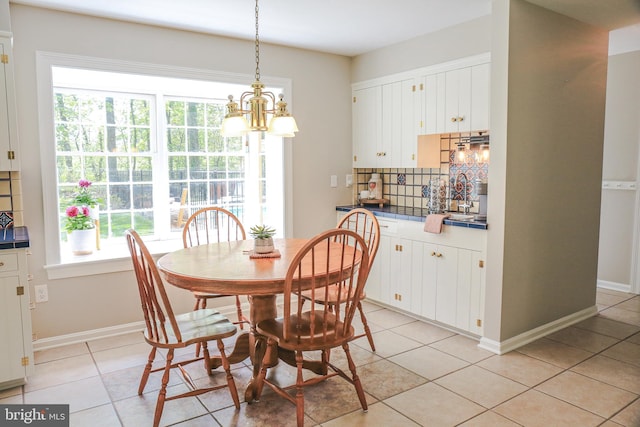 30 Woods Ln, Hanover, PA 17331 - dining space with plenty of natural light, a chandelier, light tile patterned flooring, and baseboards
