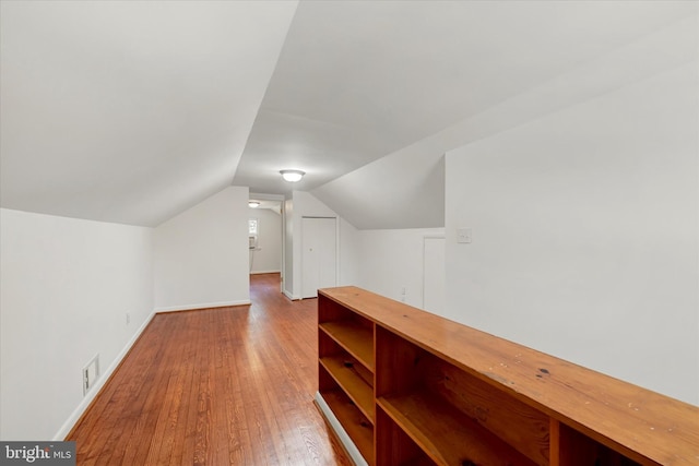 705 Stewart Ave, Glen Burnie, MD 21061 - bonus room with hardwood / wood-style flooring, vaulted ceiling, and baseboards