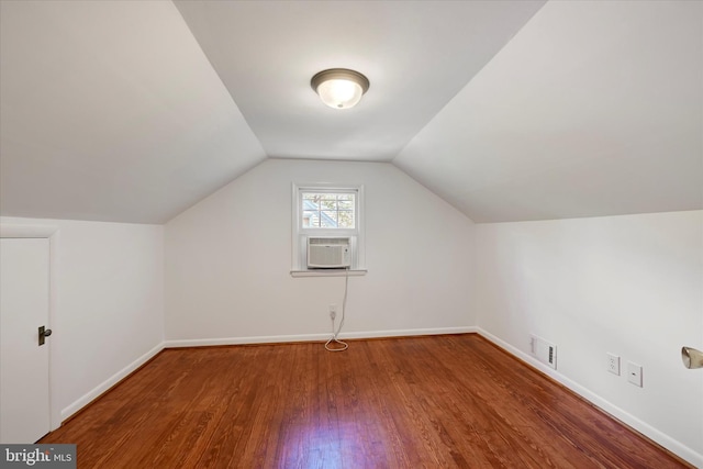 705 Stewart Ave, Glen Burnie, MD 21061 - bonus room featuring wood finished floors, baseboards, vaulted ceiling, and cooling unit