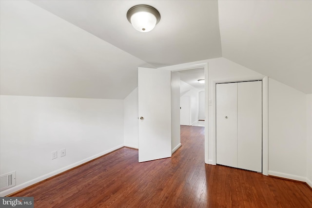 705 Stewart Ave, Glen Burnie, MD 21061 - additional living space with vaulted ceiling, wood finished floors, and baseboards