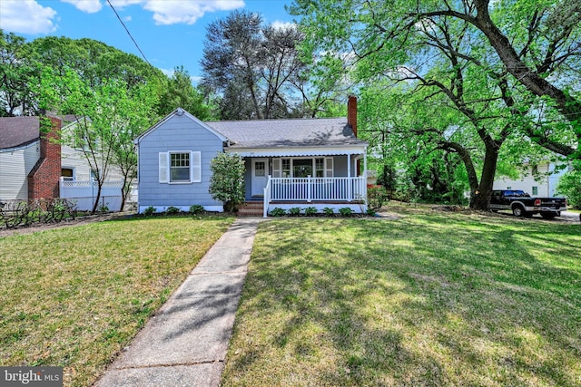 705 Stewart Ave, Glen Burnie, MD 21061 - bungalow featuring covered porch, a chimney, and a shingled roof
