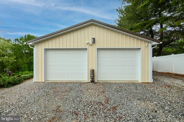 detached garage with fence