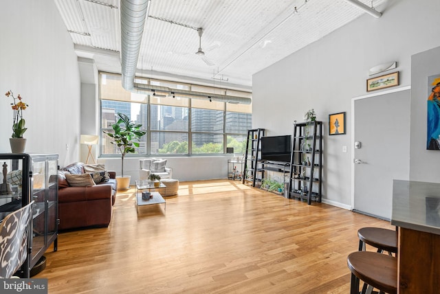 2200 Arch St Unit 409, Philadelphia, PA 19103 - living room with wood finished floors