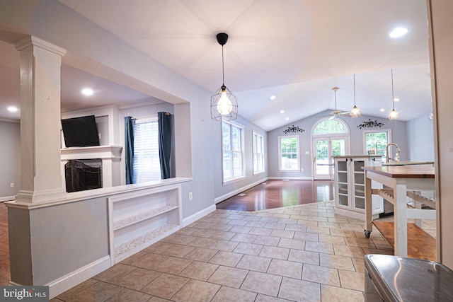 9190 Balsam Run, Bel Alton, MD 20611 - unfurnished dining area featuring lofted ceiling, recessed lighting, baseboards, a fireplace, and ornate columns