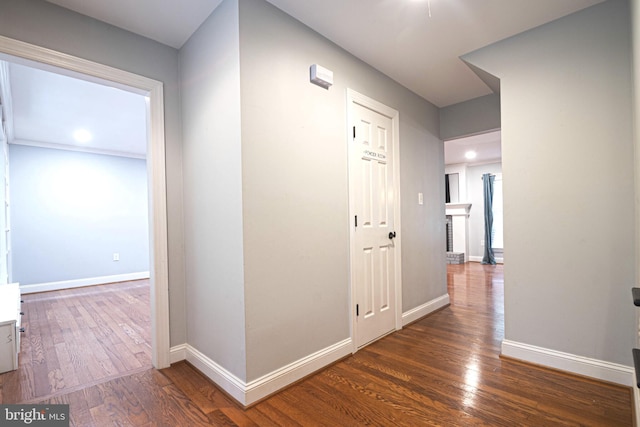 9190 Balsam Run, Bel Alton, MD 20611 - hallway with baseboards and wood finished floors