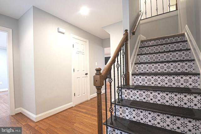 9190 Balsam Run, Bel Alton, MD 20611 - staircase featuring baseboards and wood finished floors