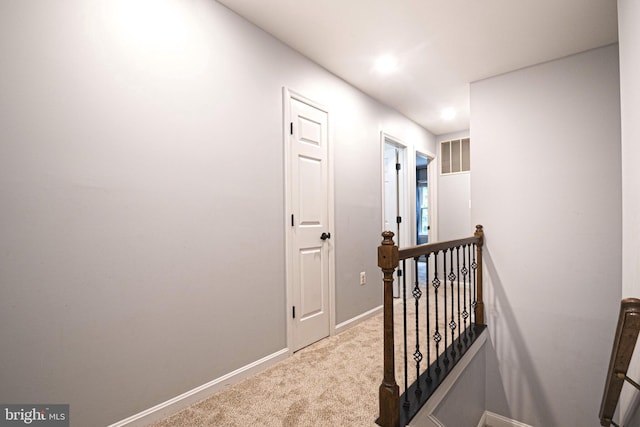 9190 Balsam Run, Bel Alton, MD 20611 - corridor with carpet flooring, baseboards, an upstairs landing, and visible vents