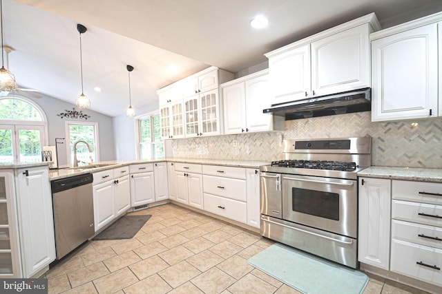 9190 Balsam Run, Bel Alton, MD 20611 - kitchen with under cabinet range hood, appliances with stainless steel finishes, plenty of natural light, and backsplash