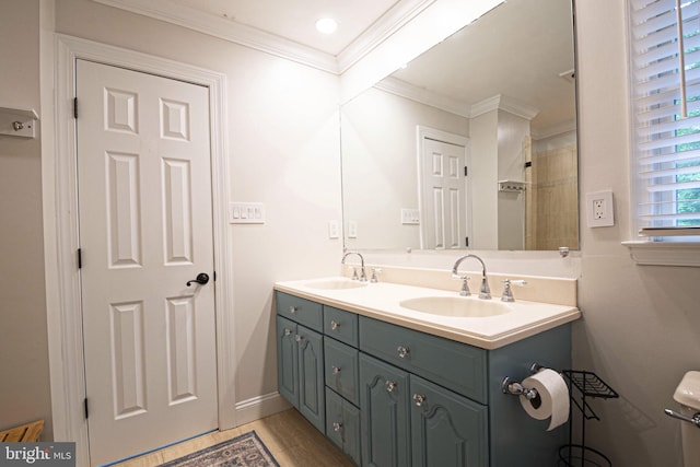 9190 Balsam Run, Bel Alton, MD 20611 - bathroom featuring double vanity, crown molding, baseboards, and a sink