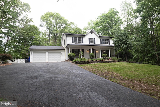9190 Balsam Run, Bel Alton, MD 20611 - colonial inspired home with a porch, fence, driveway, a garage, and a front lawn