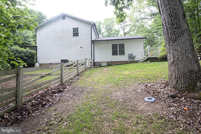9190 Balsam Run, Bel Alton, MD 20611 - back of house with crawl space, fence private yard, and a lawn