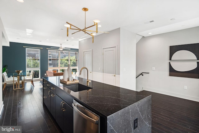 670 N 13th St, Philadelphia, PA 19123 - kitchen featuring a sink, dishwasher, dark wood-style flooring, a chandelier, and a center island with sink
