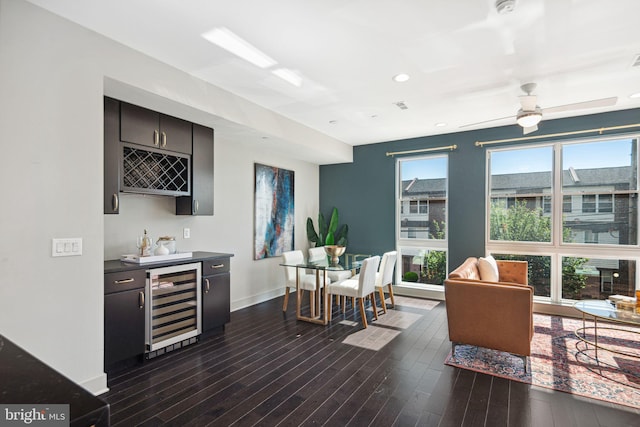 670 N 13th St, Philadelphia, PA 19123 - dining space with beverage cooler, bar with sink, baseboards, dark wood-type flooring, and recessed lighting