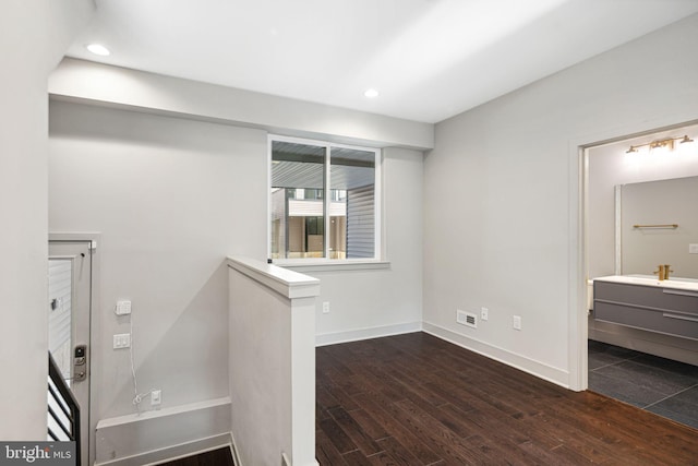 670 N 13th St, Philadelphia, PA 19123 - stairway with wood finished floors, baseboards, and recessed lighting