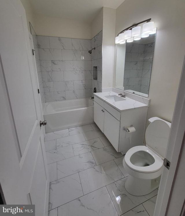 bathroom featuring toilet, shower / bath combination, marble finish floor, and vanity