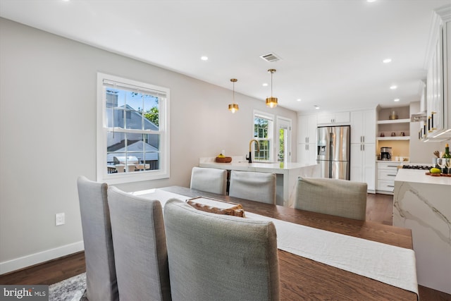 101 Oakmont Ct NE, Vienna, VA 22180 - dining area with plenty of natural light, dark wood finished floors, recessed lighting, and baseboards