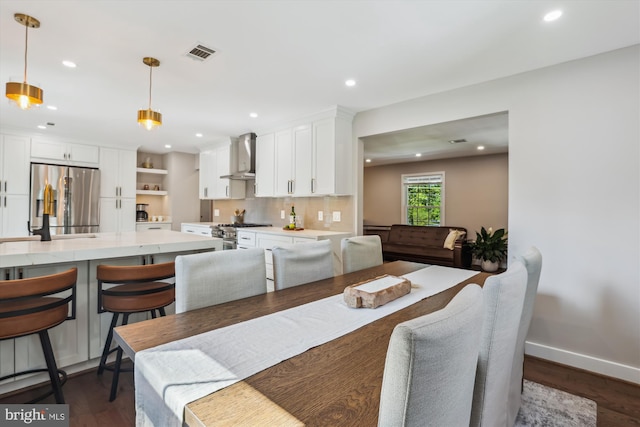 101 Oakmont Ct NE, Vienna, VA 22180 - dining area with dark wood-style floors, recessed lighting, and baseboards