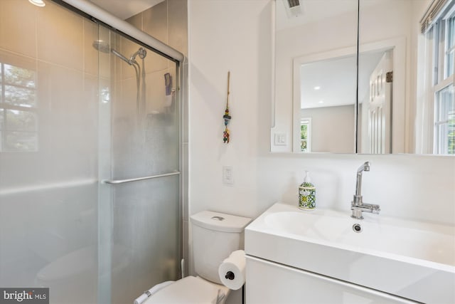 101 Oakmont Ct NE, Vienna, VA 22180 - bathroom featuring toilet, a shower stall, and vanity