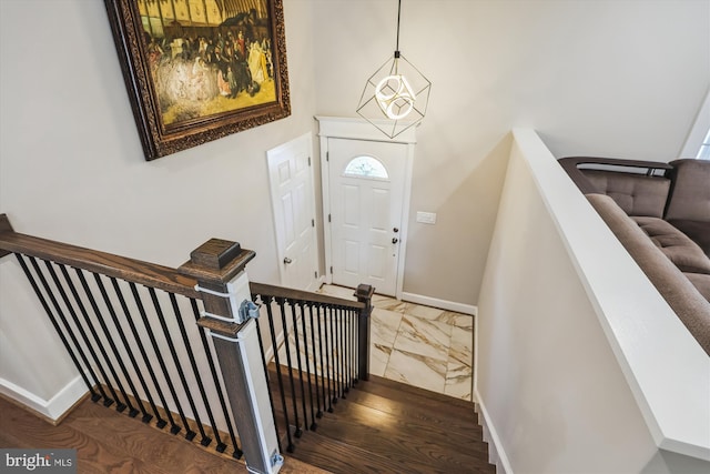 101 Oakmont Ct NE, Vienna, VA 22180 - stairs with baseboards and a high ceiling