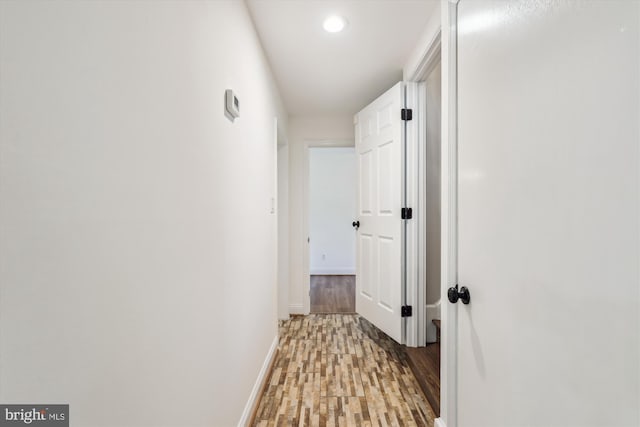 101 Oakmont Ct NE, Vienna, VA 22180 - hall with light wood-style floors, baseboards, and recessed lighting