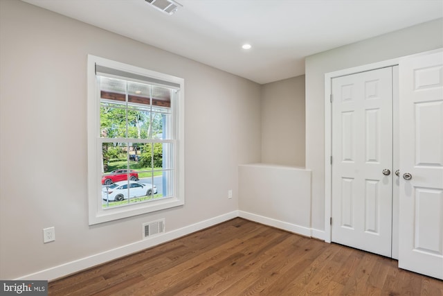 101 Oakmont Ct NE, Vienna, VA 22180 - empty room with baseboards, wood finished floors, and recessed lighting