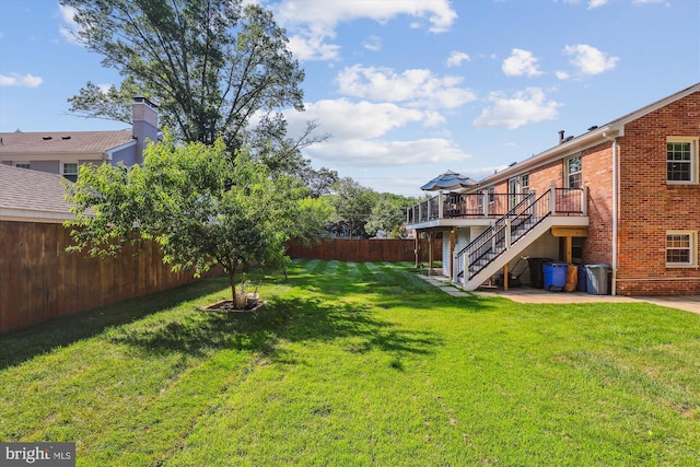 101 Oakmont Ct NE, Vienna, VA 22180 - view of yard with stairs, a deck, and a patio area