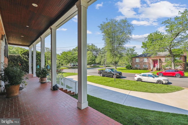 101 Oakmont Ct NE, Vienna, VA 22180 - porch featuring a lawn