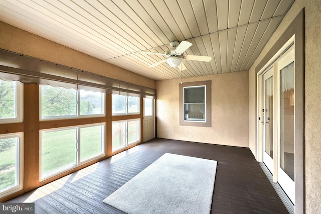 unfurnished sunroom with a wealth of natural light
