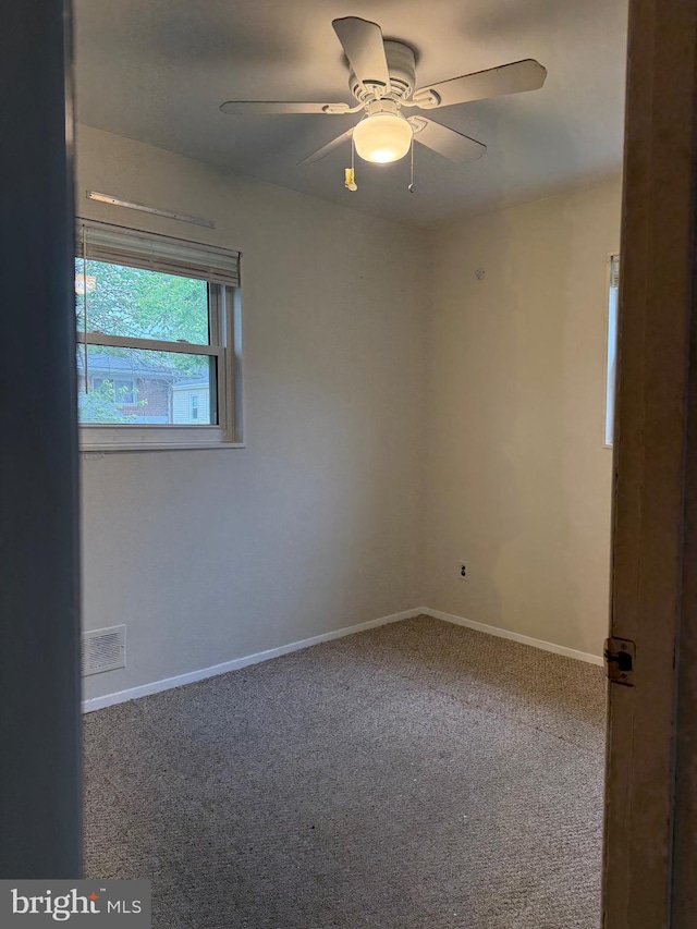 5119 19th St N, Arlington, VA 22207 - carpeted empty room with baseboards and ceiling fan