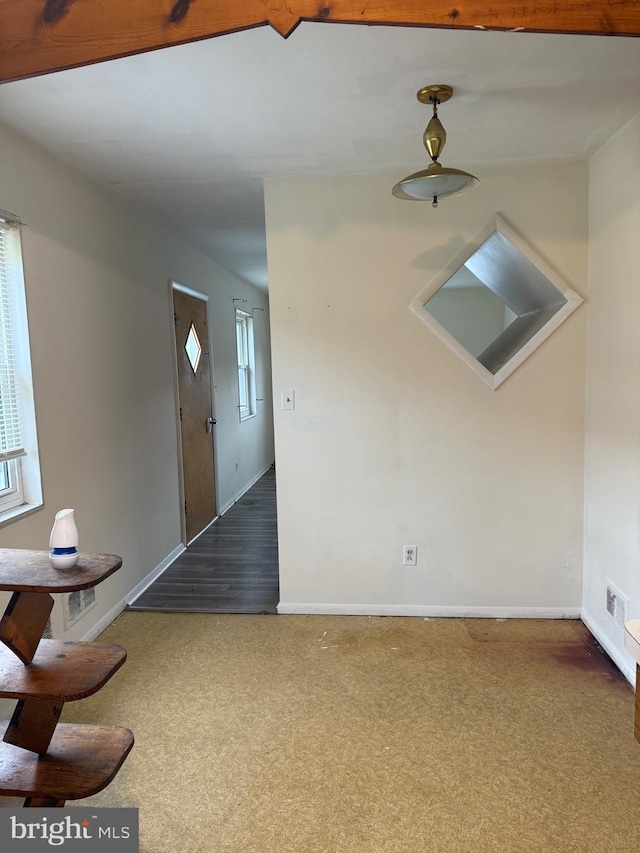 5119 19th St N, Arlington, VA 22207 - unfurnished living room featuring carpet flooring and baseboards