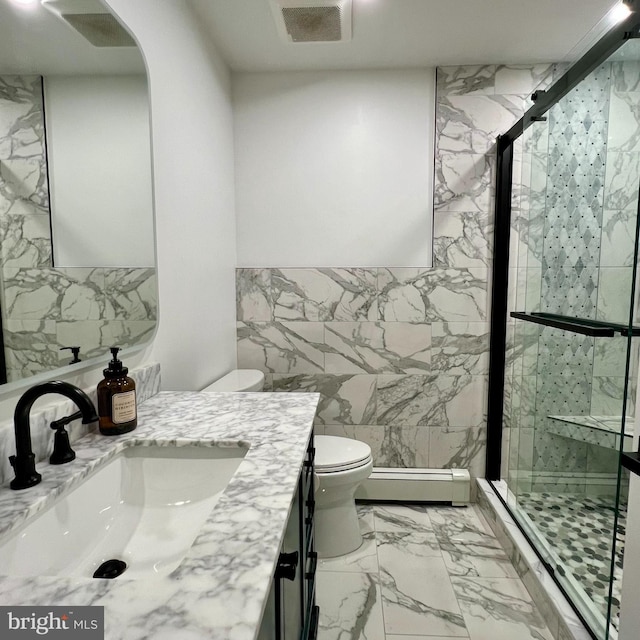 full bath featuring a baseboard heating unit, toilet, marble finish floor, visible vents, and a shower stall