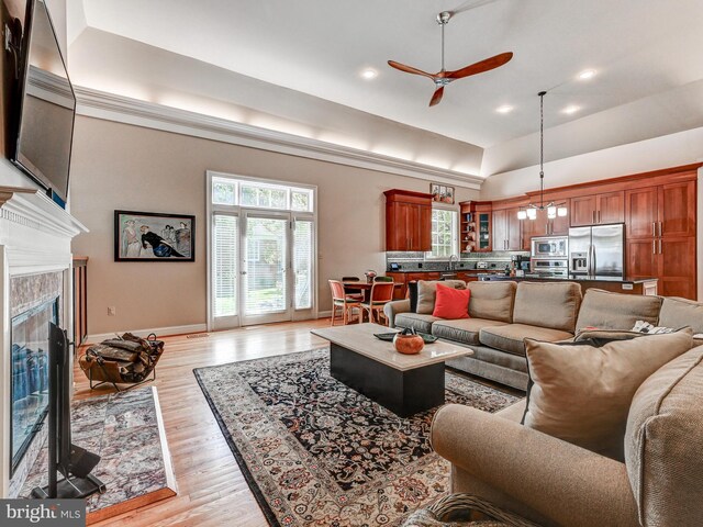 26 Bellchase Ct Unit B, Pikesville, MD 21208 - living area with a ceiling fan, a fireplace, light wood-type flooring, baseboards, and recessed lighting