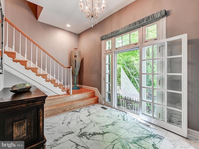 26 Bellchase Ct Unit B, Pikesville, MD 21208 - foyer featuring marble look tiles, stairway, a chandelier, recessed lighting, and baseboards