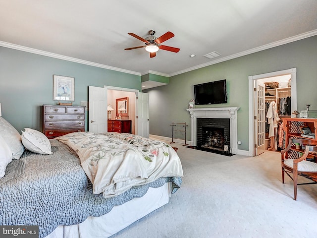 26 Bellchase Ct Unit B, Pikesville, MD 21208 - carpeted bedroom with crown molding, a walk in closet, baseboards, a fireplace with flush hearth, and a closet