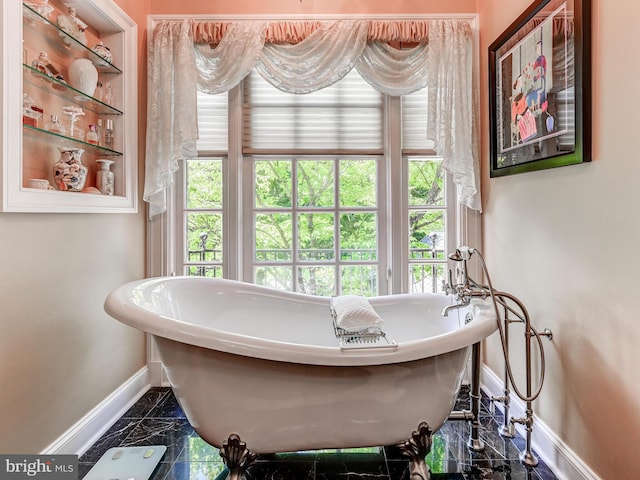 26 Bellchase Ct Unit B, Pikesville, MD 21208 - full bathroom featuring baseboards, marble finish flooring, and a soaking tub
