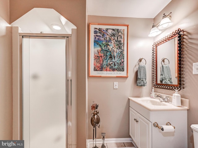 26 Bellchase Ct Unit B, Pikesville, MD 21208 - bathroom featuring a stall shower, vanity, toilet, and baseboards