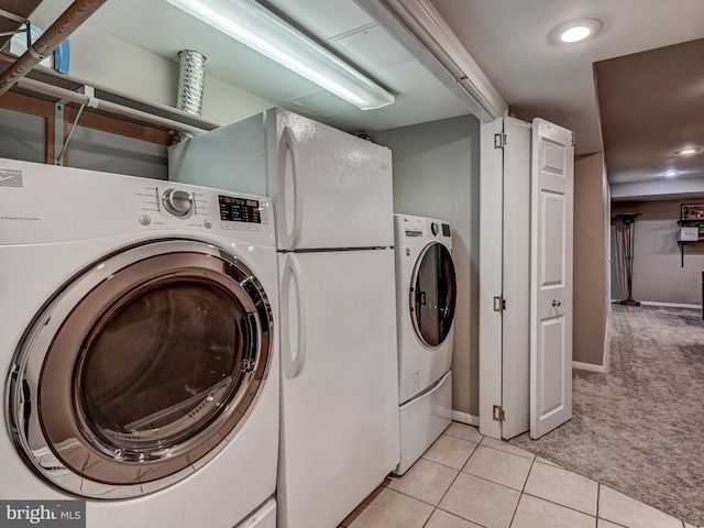 26 Bellchase Ct Unit B, Pikesville, MD 21208 - laundry room with separate washer and dryer, light colored carpet, light tile patterned floors, baseboards, and recessed lighting