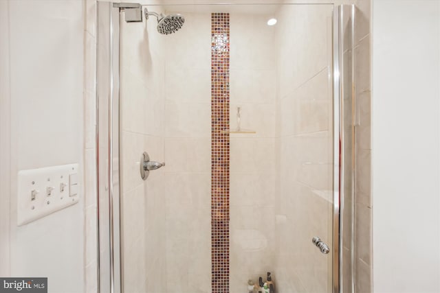 full bath featuring a stall shower