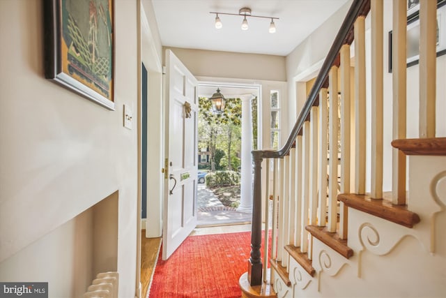 foyer entrance featuring stairs